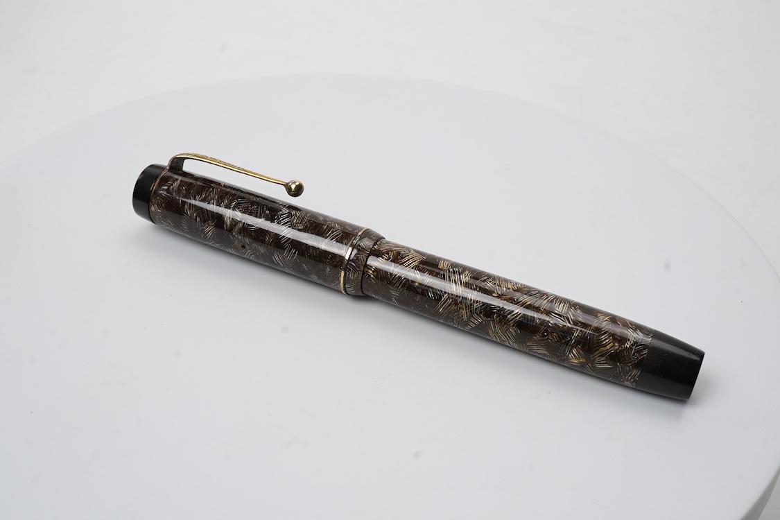 A Parker Senior UK Duofold 'brown candy stripe' fountain pen with 14ct. gold 'N' nib